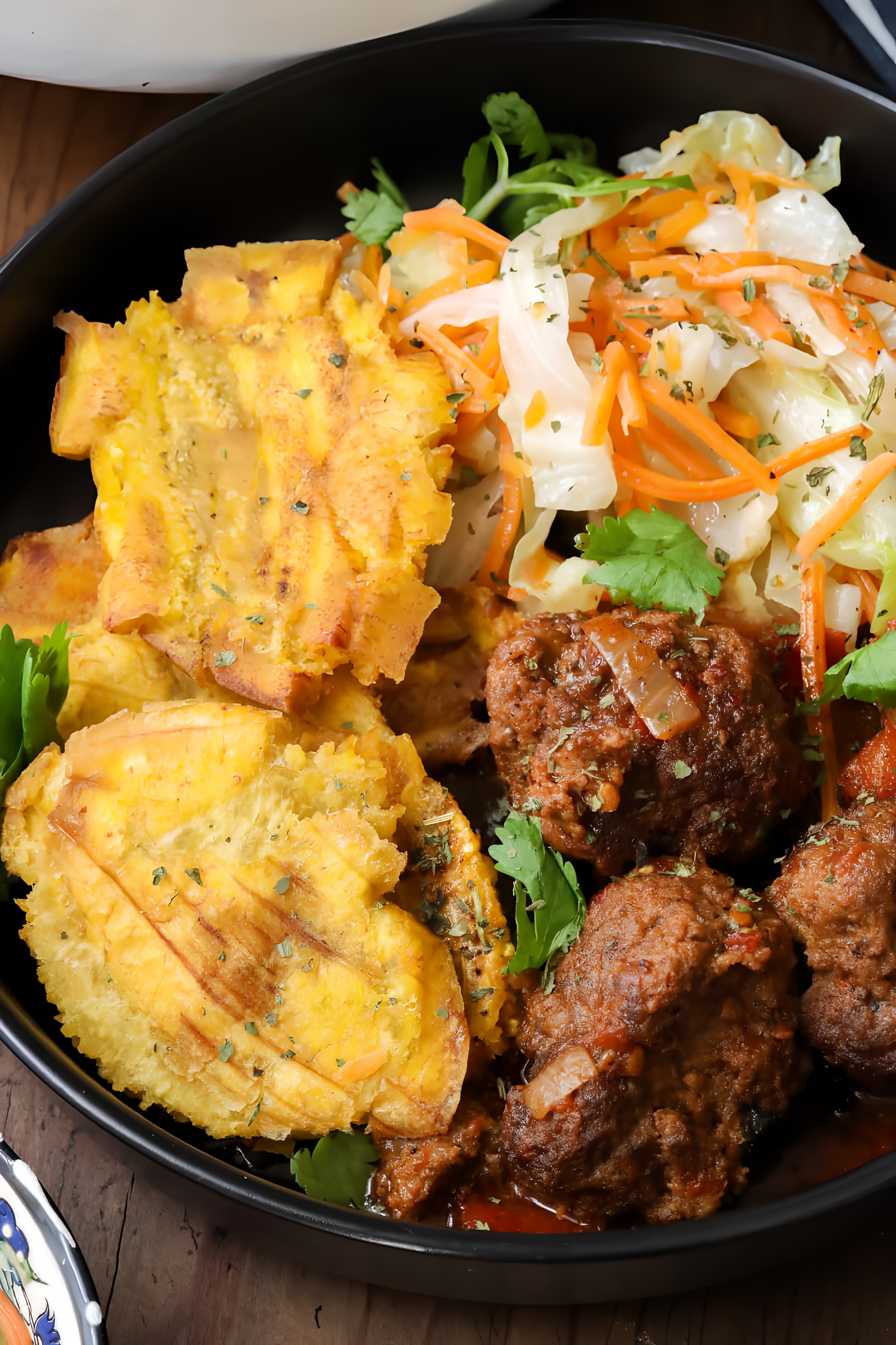 Tasso (Fried Goat pcs) with Plantains & Pikliz